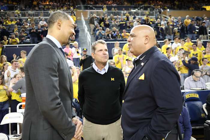 Juwan howard jim harbaugh warde manuel